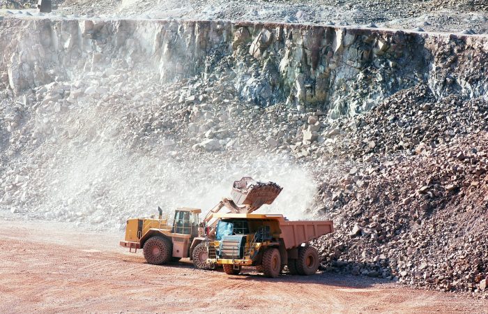 Ground Treasures Expands Global Reach with New Strategic Partnerships 1 earth mover loading stones on a dumper truck. mining industries.